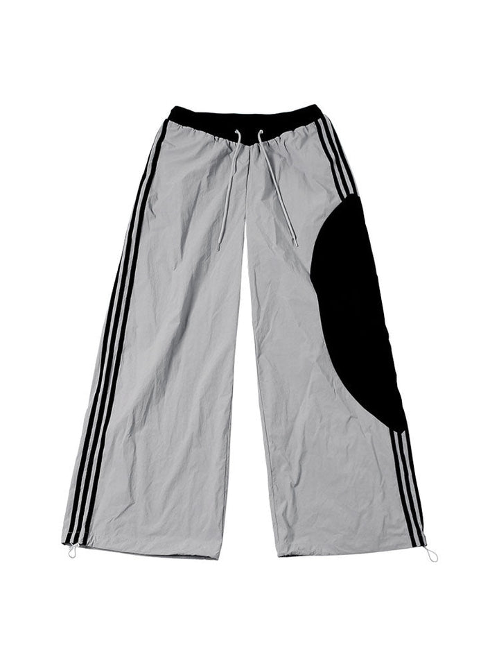 Graue Damen Oversized Jogginghose mit weitem Bein für bequemen Alltag & Freizeit. Lockerer Schnitt, elastischer Bund.
