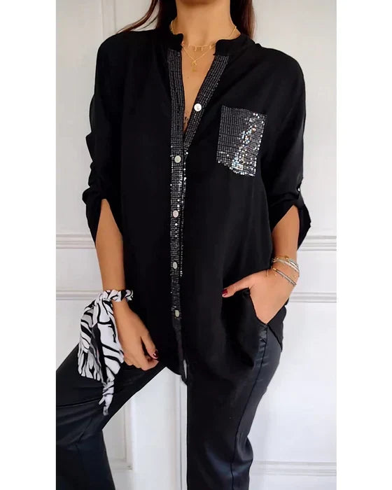 Damen Top mit schimmernden Pailletten und praktischer Knopfleiste. Lässig-elegant.