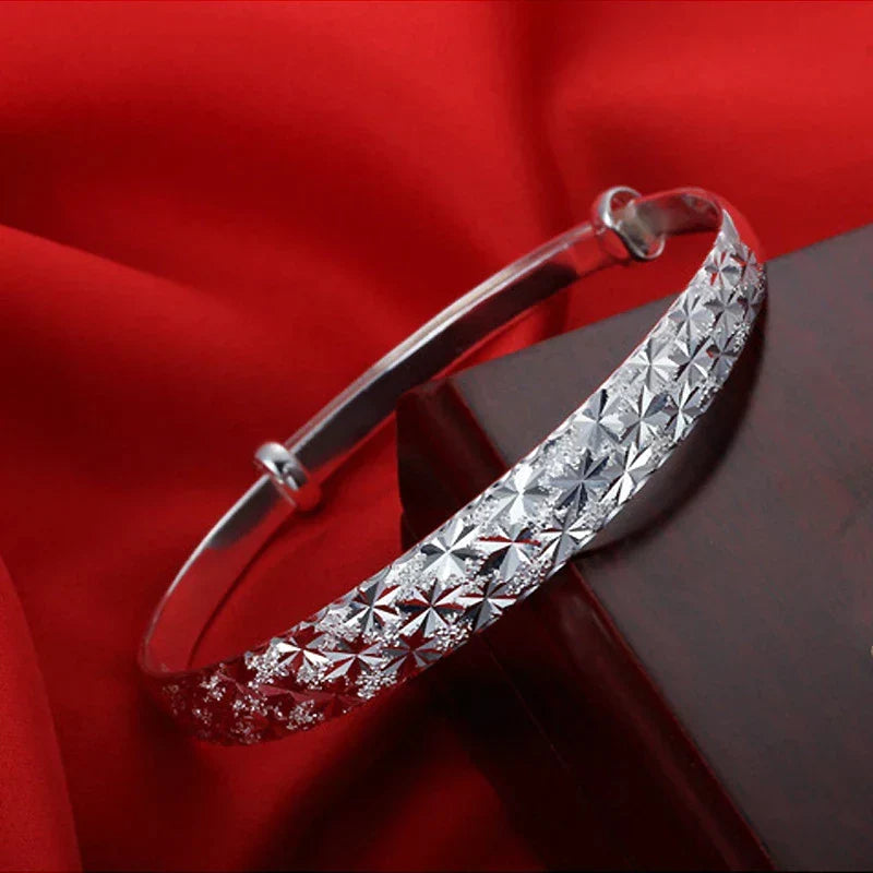 Elegantes Sternarmband aus 925er Silber für Damen, filigraner Schmuck, perfekte Geschenkidee.