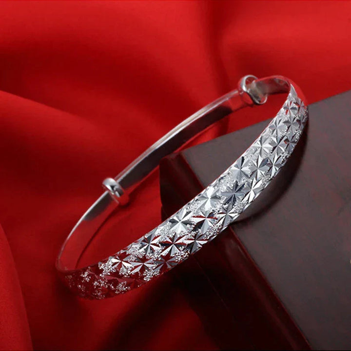 Elegantes Sternarmband aus 925er Silber für Damen, filigraner Schmuck, perfekte Geschenkidee.