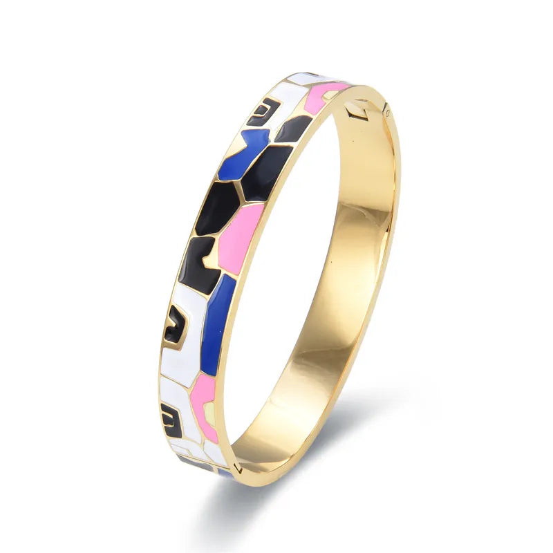 Eleganter Damen Armreif goldfarben, Geode Design, aus hochwertigem Edelstahl, ideal für jeden Anlass.