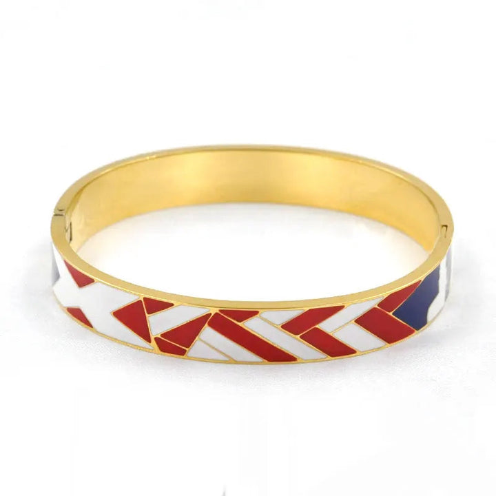 Goldener Geode Armreif für Damen, hochglänzender Edelstahl mit Emaille-Details, eleganter Handschmuck.