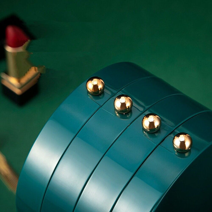 Faltbarer Schmuck-Organizer mit ovalem Design und Spiegel, hält Accessoires ordentlich und griffbereit.