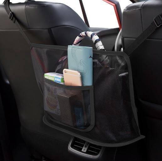 Auto-Organizer Netztasche gefüllt mit Utensilien. Perfekt für Flaschen, Zeitschriften & andere kleine Gegenstände.