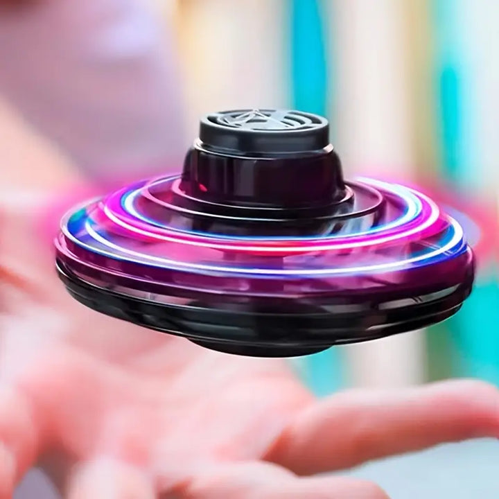 Schwebender UFO Spielball für Kinder mit Infrarotsensorik, bietet interaktiven Flugspaß.