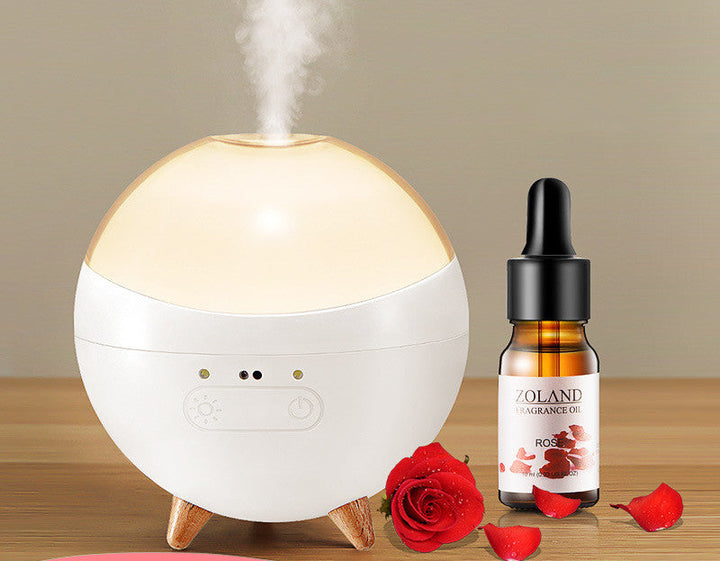 Aroma Diffuser für Wellness und Ambiente: Ultraschall-Nebel, farbiges Stimmungslicht und bequeme Gestensteuerung.