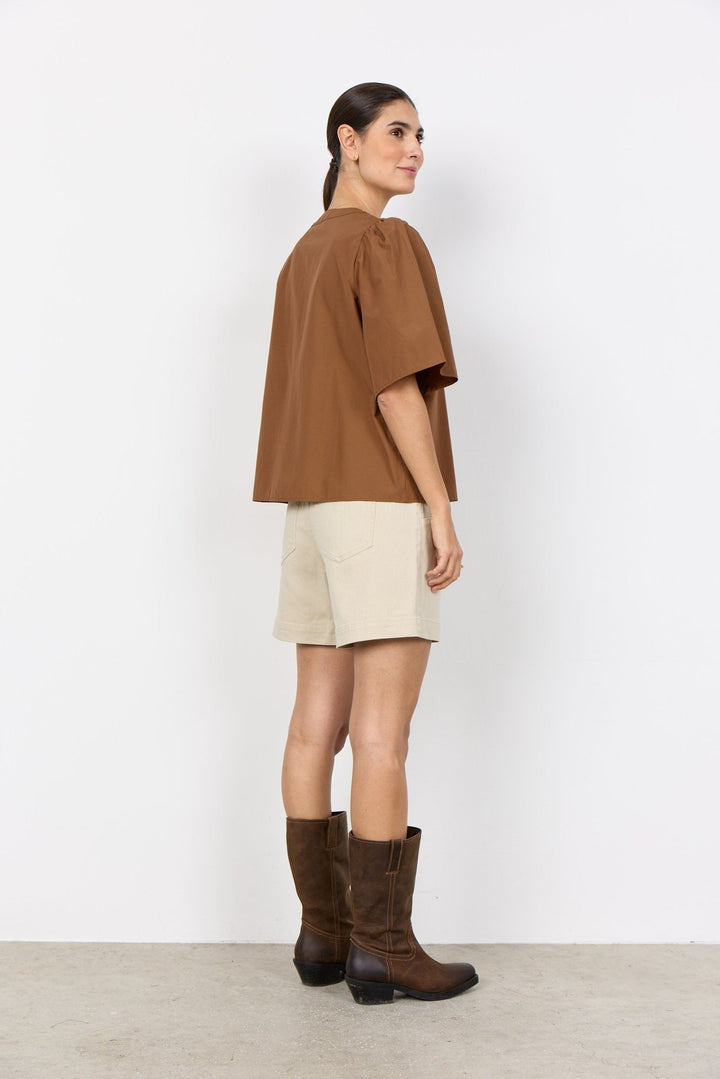 Bequeme Kurzarmbluse für Damen mit elegantem Rundkragen. Ein vielseitiges Oberteil für Alltag und besondere Anlässe.