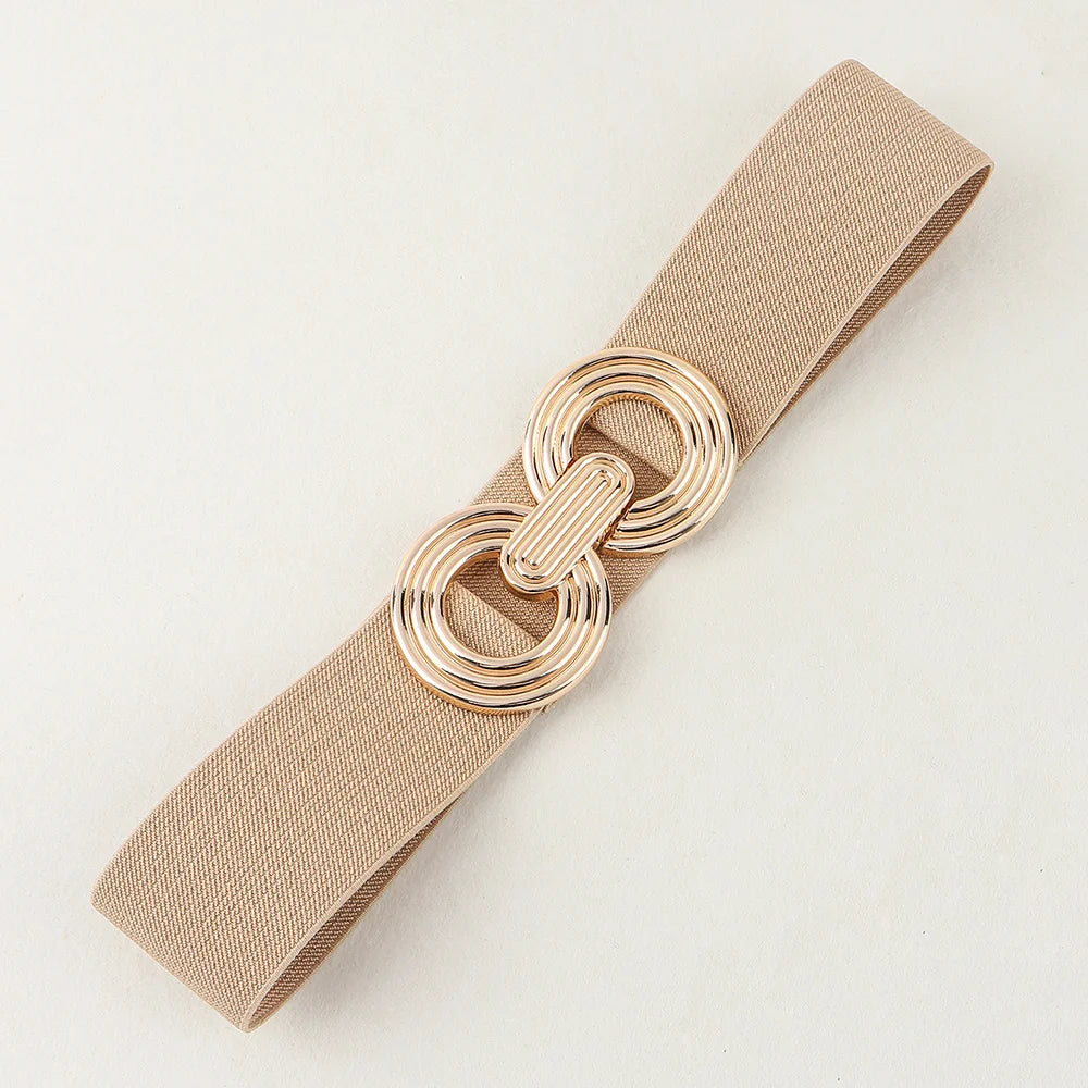 Hochwertiger Damen Modegürtel mit runder, metallischer Schnalle. Vielseitig kombinierbar für jeden Look.