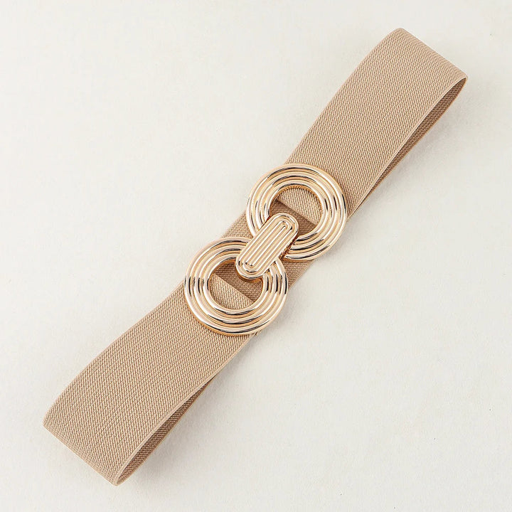 Hochwertiger Damen Modegürtel mit runder, metallischer Schnalle. Vielseitig kombinierbar für jeden Look.