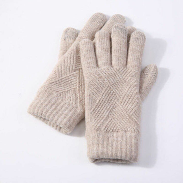 Damen Winterhandschuhe in Benutzung, die Touchscreen-Funktion am Smartphone demonstrierend. Warm & praktisch.