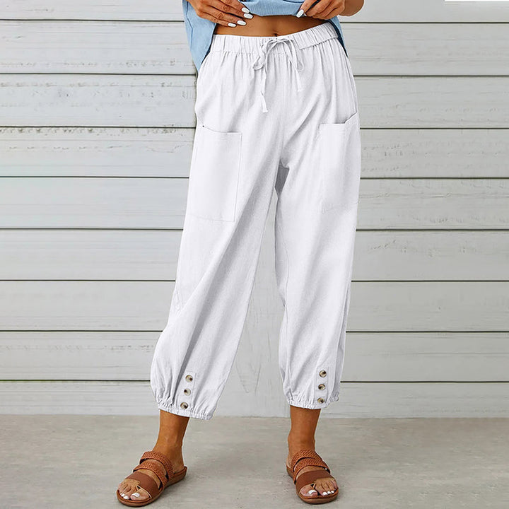Stilvolle Damen 7/8-Hose, mittelhoher Bund, Kordelzug. Lockere Passform, perfekt als bequeme Freizeithose.
