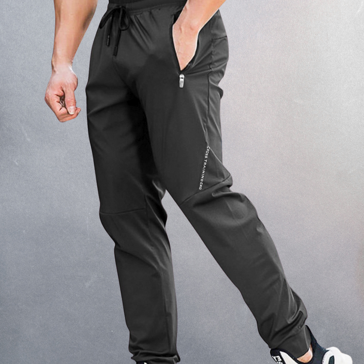 Herren Sporthose Slim Fit, atmungsaktiv, ideal für Training, Fitness und Freizeit; mit praktischen Reißverschlusstaschen.