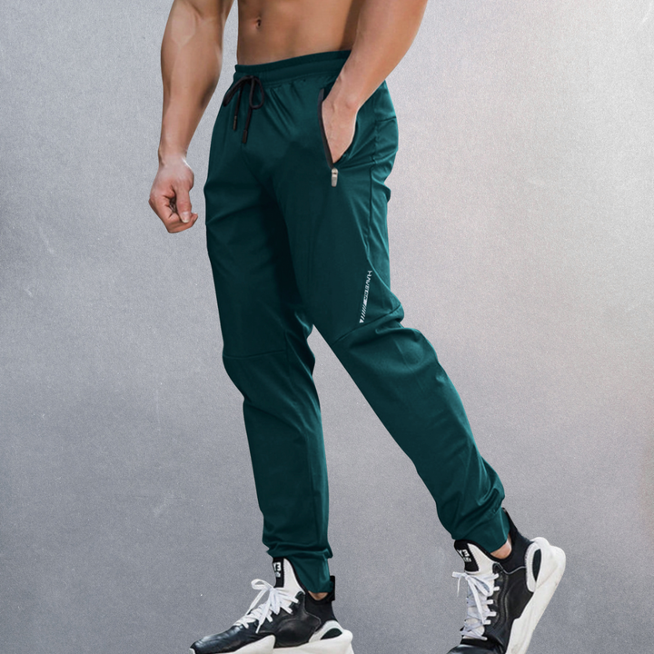 Moderne Herren Trainingshose Slim Fit, sehr bequem und atmungsaktiv, perfekt für Workout oder entspannte Tage.
