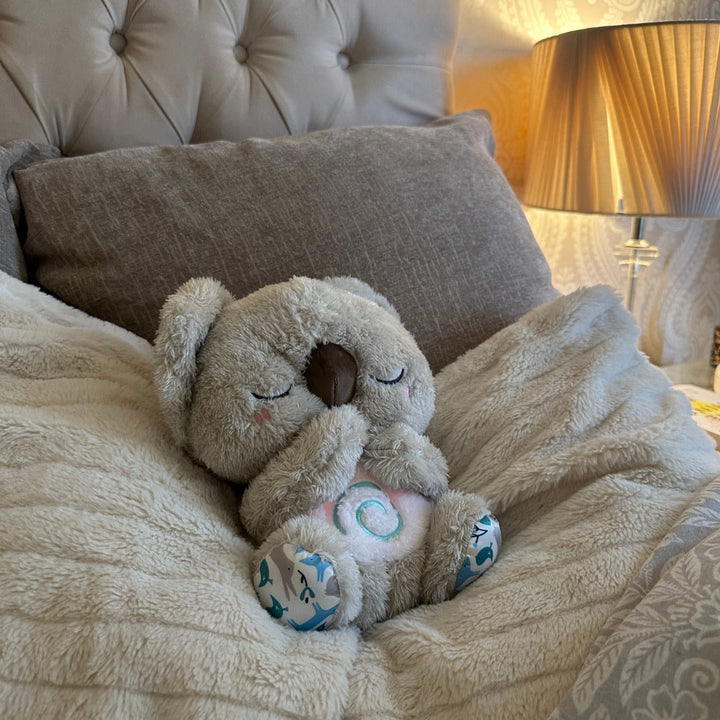 Interaktives Koala-Atemspielzeug mit Licht, eine sanfte Schlafhilfe für ruhige Nächte der Kinder.