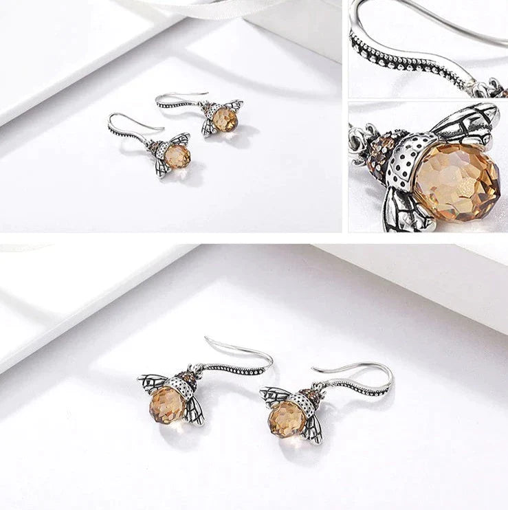 Wunderschöne Damen Tropfenohrringe mit facettenreichem Bienenkönigin-Kristall. Eleganter Damenschmuck.