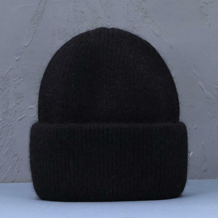 Warme Damen Beanie Wintermütze, gemütlich und weich, ideal als stilvolle Kopfbedeckung für den Winter.