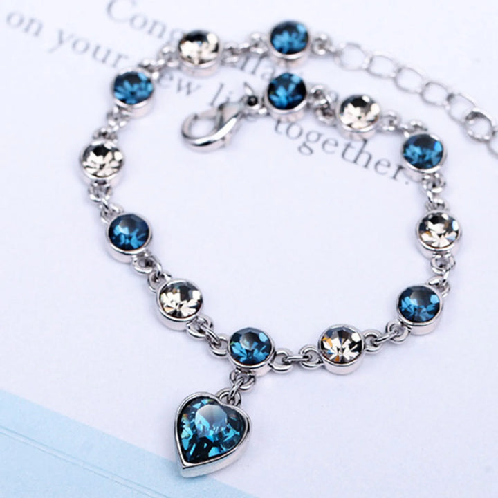 Elegantes Silberarmband 'Herz des Ozeans' für Damen, verziert mit glitzernden Zirkonia-Steinen.