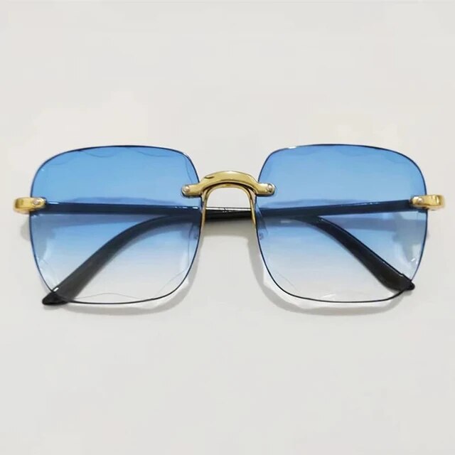 Hochwertige randlose Sonnenbrille im Vintage-Design. Unisex, UV400, mit eleganten Verlaufsgläsern.