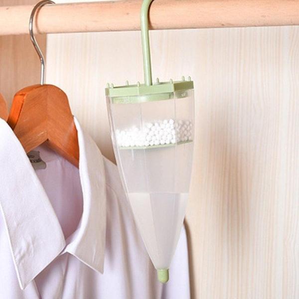 Praktischer Regenschirm-Entfeuchter für optimales Raumklima, reduziert Feuchtigkeit im Haus.