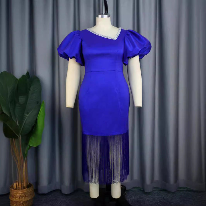 Festliches Damen Cocktailkleid in Blau mit Puffärmeln und Fransen. Ideal für Partys.