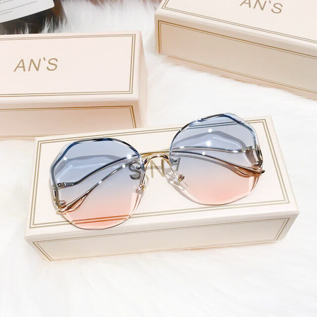 Sommerliche Unisex-Sonnenbrille mit Farbverlauf-Effekt, schützt stilvoll die Augen.