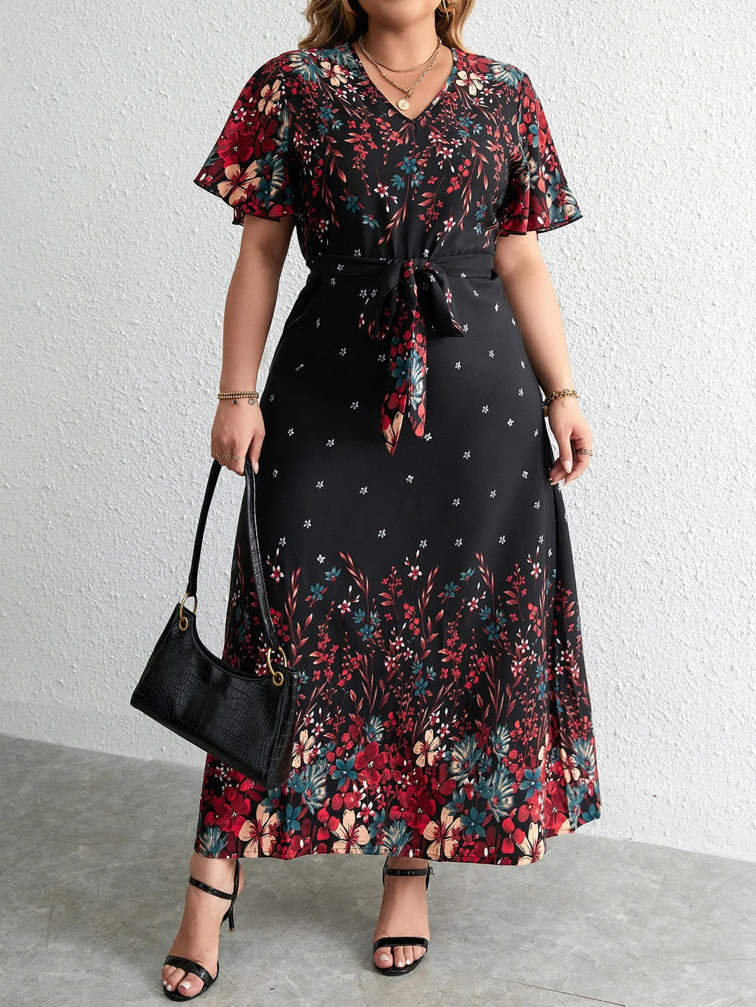 Elegantes Damen Blumen Maxikleid Übergröße mit V-Ausschnitt & Kurzarm, ideal für Herbst & Freizeit, bequem geschnitten.