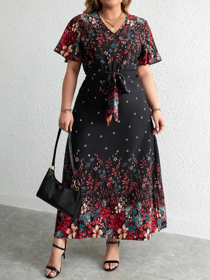 Elegantes Damen Blumen Maxikleid Übergröße mit V-Ausschnitt & Kurzarm, ideal für Herbst & Freizeit, bequem geschnitten.