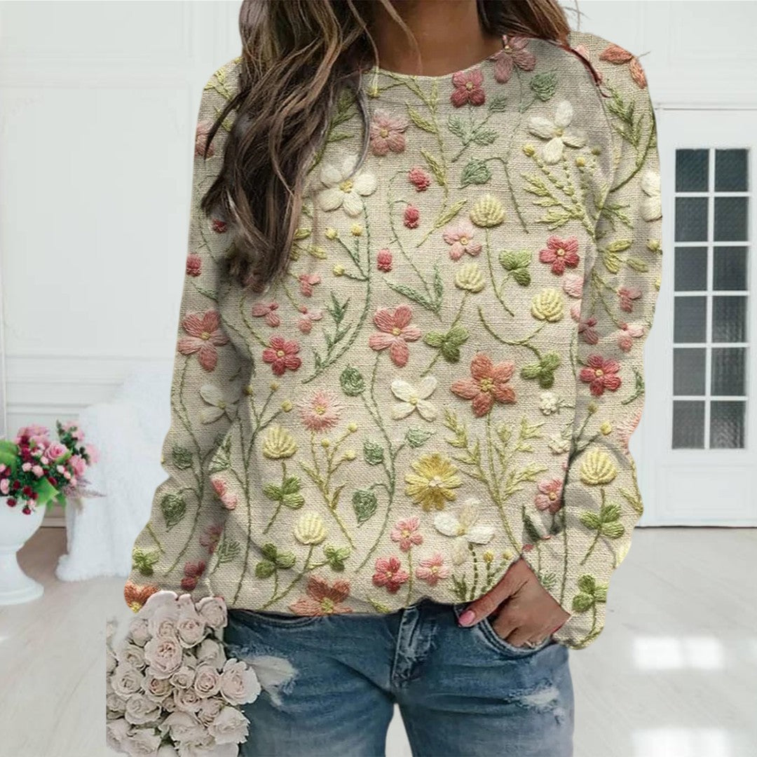 Stilvoller Damenpullover mit elegantem floralem Blumenmuster. Bequemer Langarmpullover für modische Herbst-/Frühlingsoutfits.