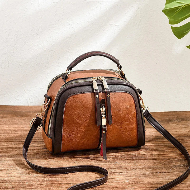 Luxuriöse Damenhandtasche mit exklusivem Alligator-Muster. Statement für Eleganz und Stil.