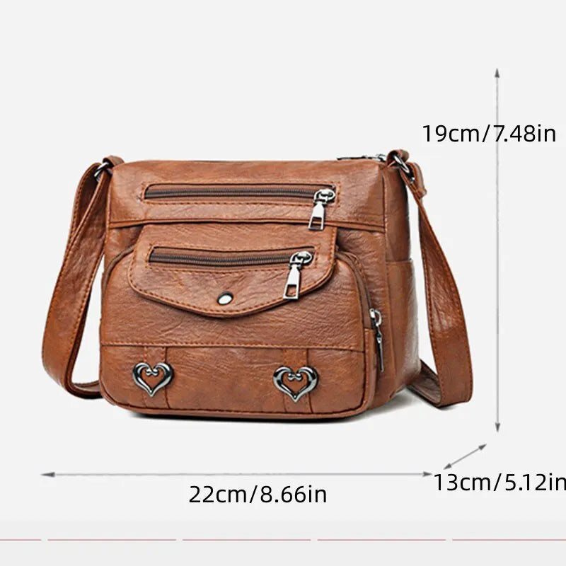 Robuste Damen Messenger Tasche für den Alltag, in schicker schwarzer Ausführung.