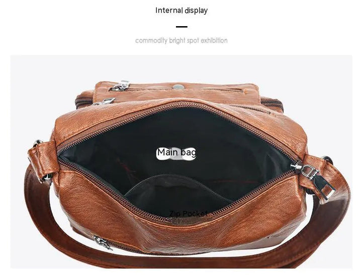 Moderne Damen Messenger Tasche (Schwarz) lässig über der Schulter getragen.