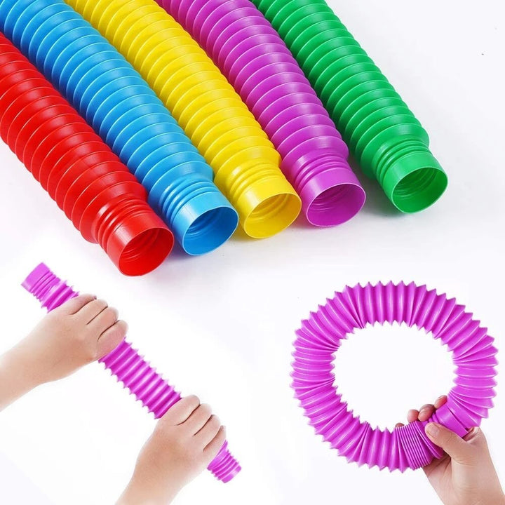 Detailansicht der texturierten Pop Röhren, perfekt für taktile Stimulation, Knackspaß & Fidgeting.
