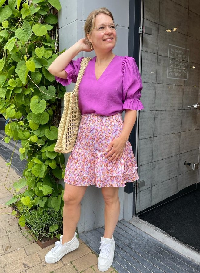 Rosa Damen Sommerrock, leicht & elegant. Ideal für Freizeit oder Business Casual Outfits.