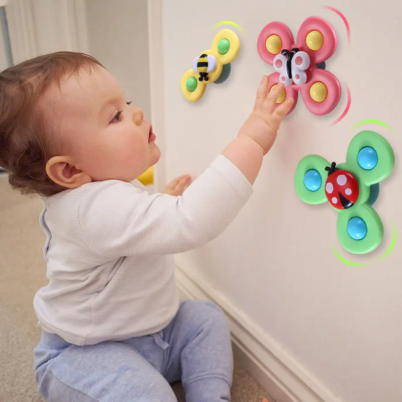 Entwicklungsförderndes Saugnapf Spinner Spielzeug für Babys & Kleinkinder, bunt und sicher.