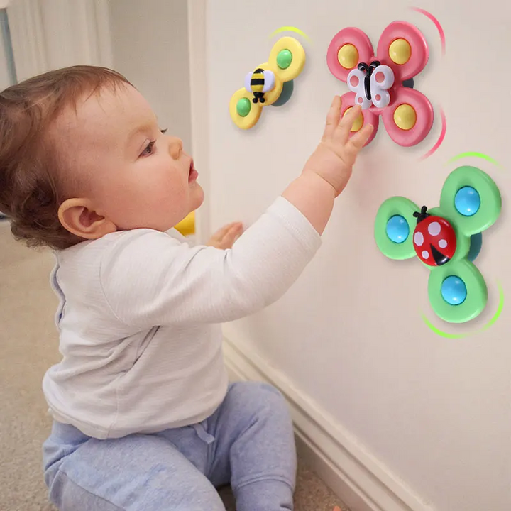 Entwicklungsförderndes Saugnapf Spinner Spielzeug für Babys & Kleinkinder, bunt und sicher.