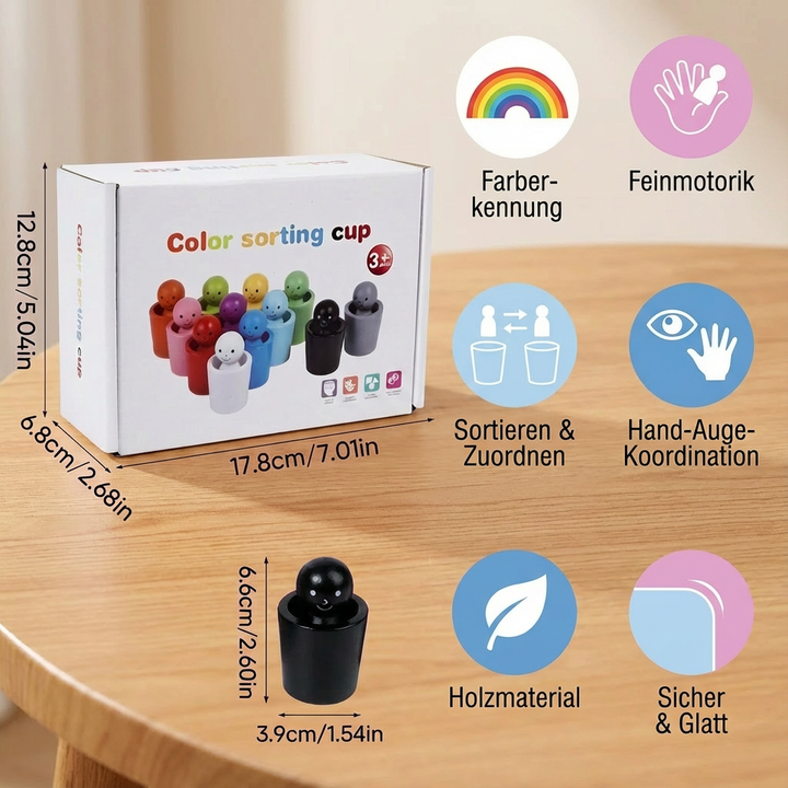 Komplettes Set: mehrere bunte Holzbecher und passende Kugeln. Montessori Sortierspiel zur Förderung von Kindern.
