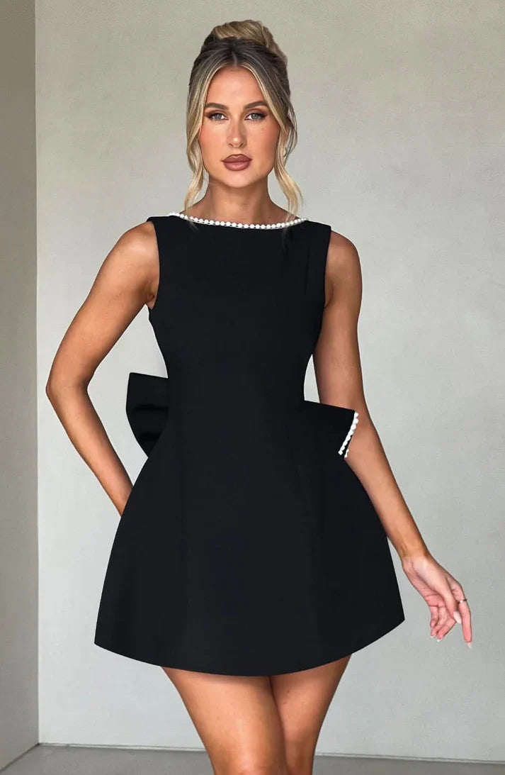 Modisches A-Linien-Minikleid für Damen, ärmellos, mit stilvollem Perlenbesatz. Perfekt als Partykleid.