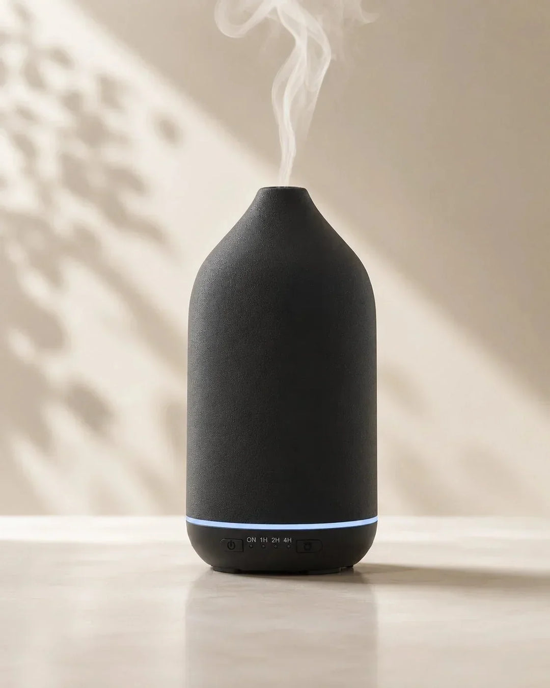 Eleganter Keramik Aroma Diffuser mit 7 wechselnden LED-Farben für entspannendes Ambiente und Wohlbefinden.