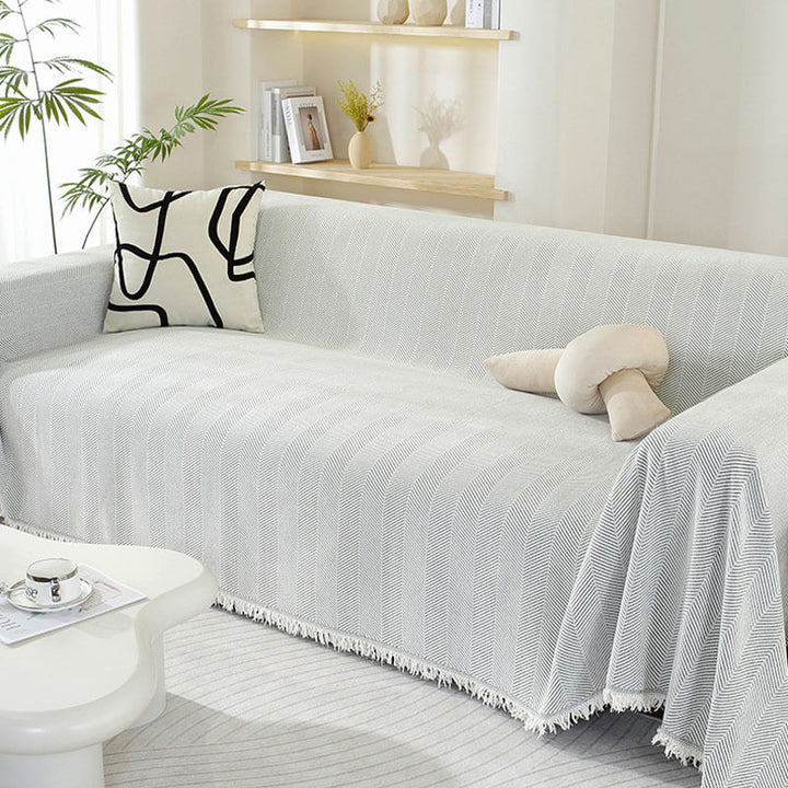 Moderner Chenille Sofabezug mit Quasten, schützt & dekoriert Ihr Wohnzimmer Sofa stilvoll.