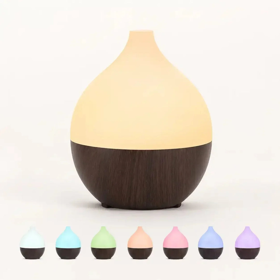 Eleganter Mini Aroma Diffuser mit LED-Licht für Schlafzimmer, Kaltnebel & entspannenden Raumduft.