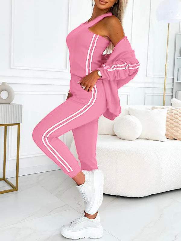 Hochwertiger, atmungsaktiver Stoff des Damen Jogginganzugs, Nahaufnahme der Materialtextur.