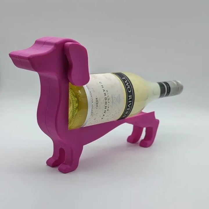 Geschenkidee für Weinliebhaber: Dackel Weinflaschenhalter aus Kunstharz, ein echter Hingucker.