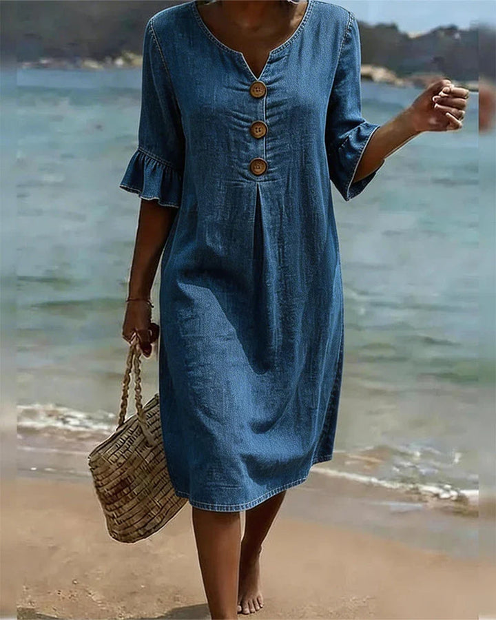 Lockeres Damen Midi-Kleid mit halben Ärmeln und Rundhalsausschnitt. Bequemes Sommerkleid für Freizeit und Frühling.