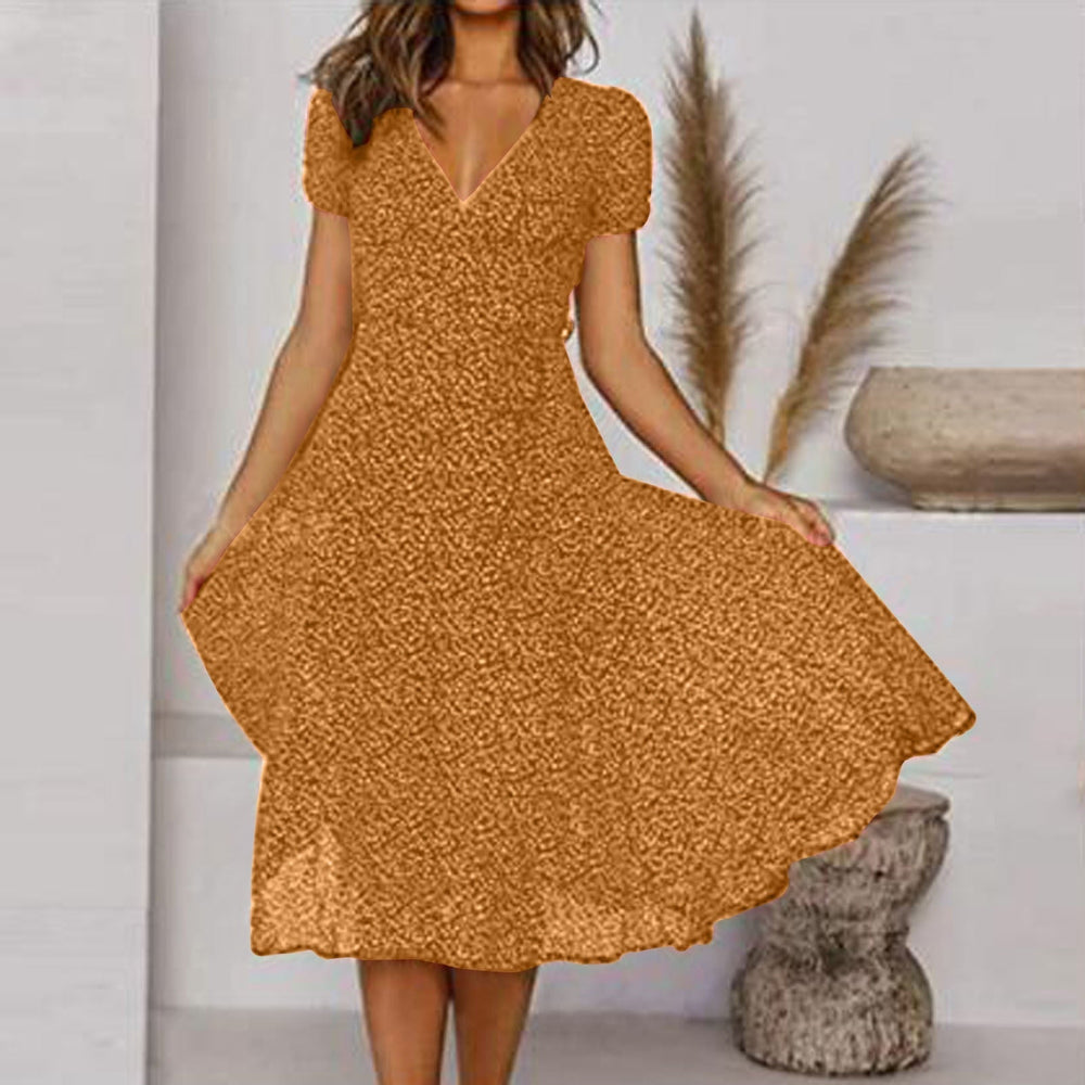 Fließendes Damen A-Linien Sommerkleid mit V-Ausschnitt und lebhaftem Blumenmuster. Perfektes Strandkleid.