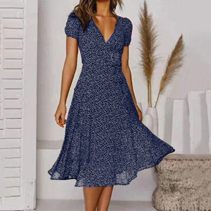 Damen Freizeitkleid in A-Linie mit auffälligem Blumenmuster. Bequemes und stilvolles Sommerkleid mit V-Ausschnitt.