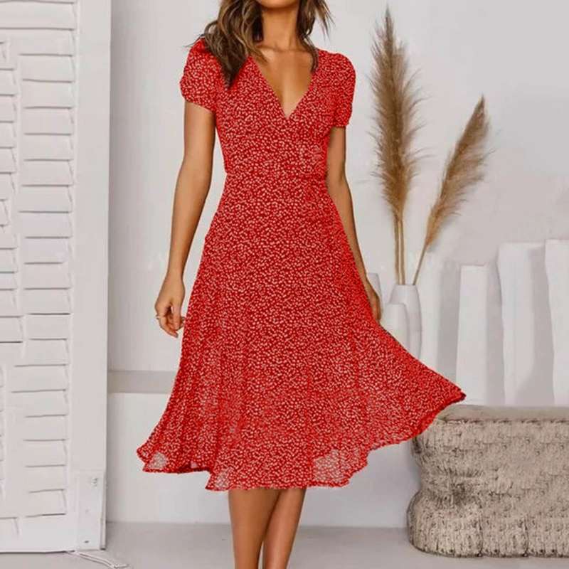 Luftiges Damen Sommerkleid in A-Linie, knielang, mit V-Ausschnitt und frischem Blumenmuster. Elegant & leicht.