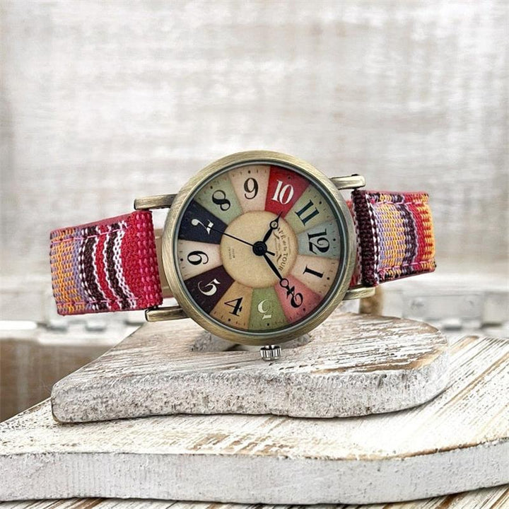 Auffällige Damen Armbanduhr mit leuchtendem Regenbogen-Design und bequemem geflochtenem PU-Lederarmband.