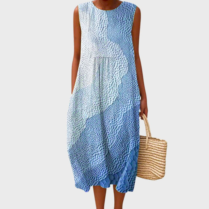 Knielanges, leichtes Damen Sommerkleid aus Baumwolle. Elegantes, zeitloses Design, ideal für Frühlings-Outfits.
