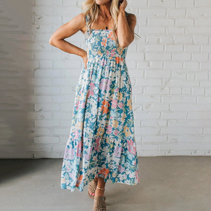 Damen Blumen Maxikleid mit gerafftem Oberteil, fließendem Rock. Perfekt als Sommer-, Urlaubs- oder Freizeitkleid.