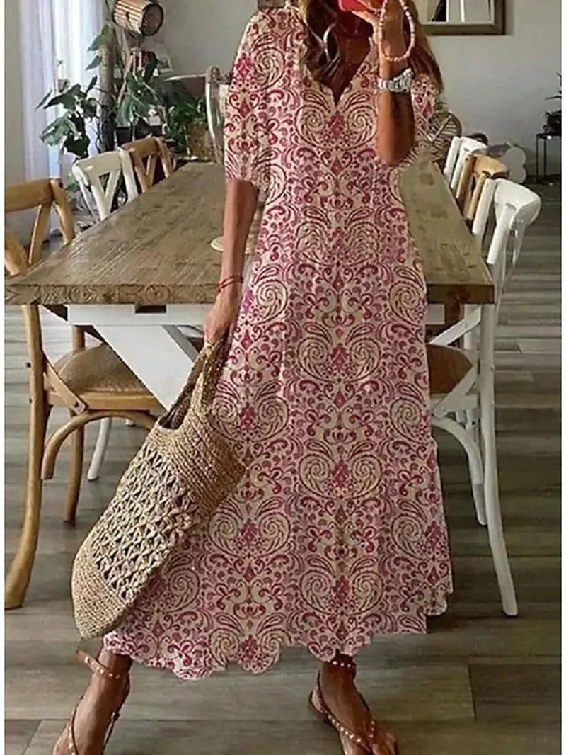 Schönes Damen Maxikleid mit Blumenprint in A-Linie, perfekt als elegantes Sommerkleid für entspannte Tage.